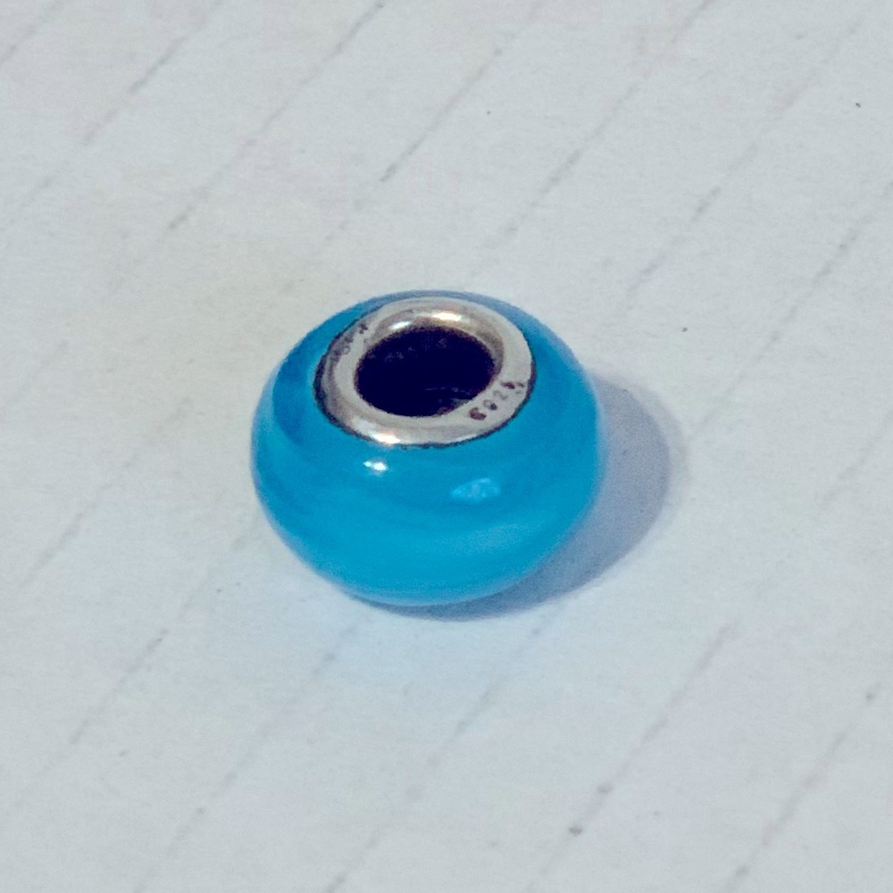 Single blue glass bead